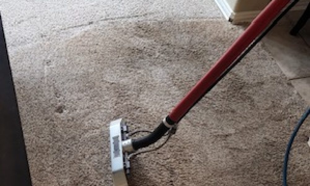 Deep cleaning a carpeted floor